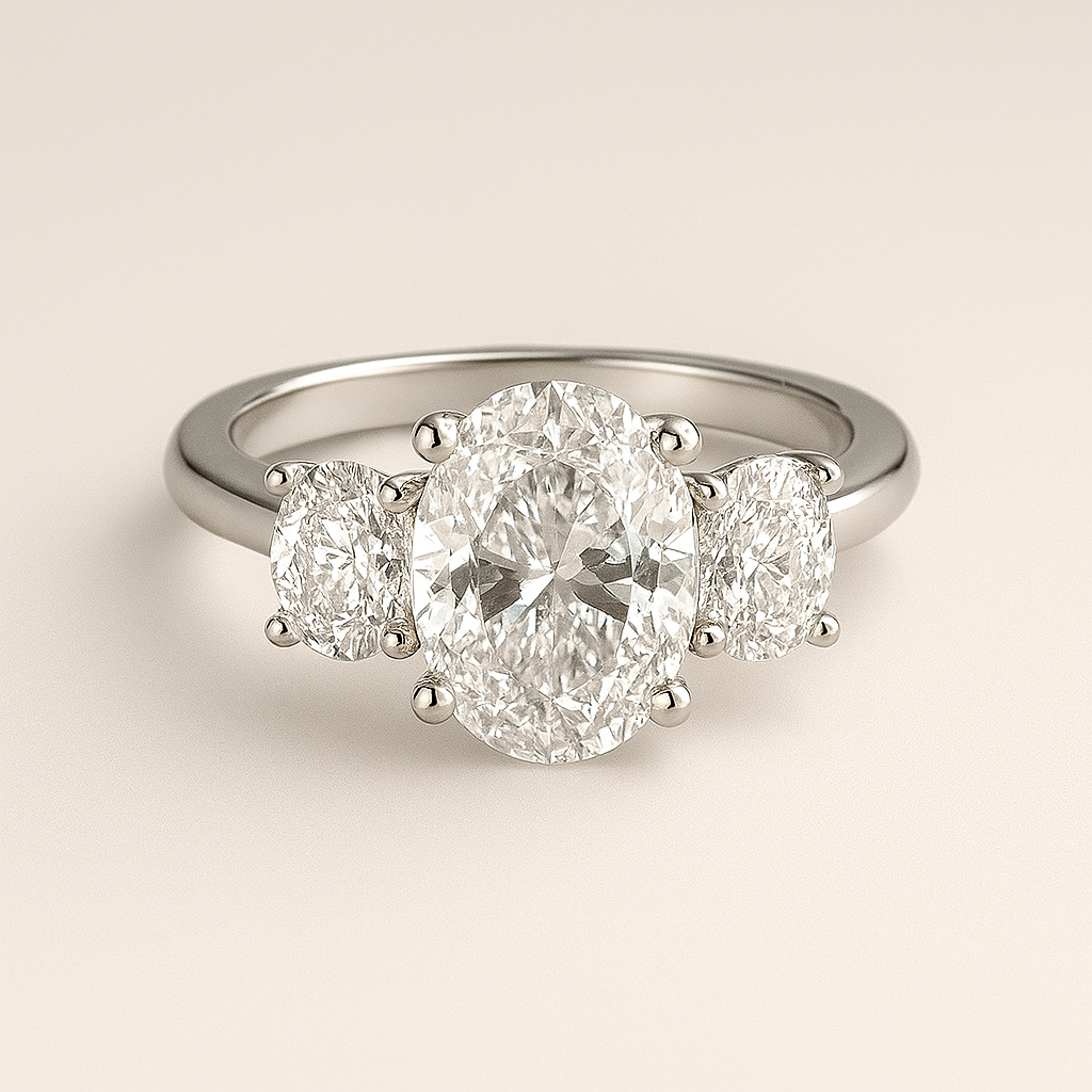 3-Stone Oval Engagement Ring – Oval Center with Round Side Stones